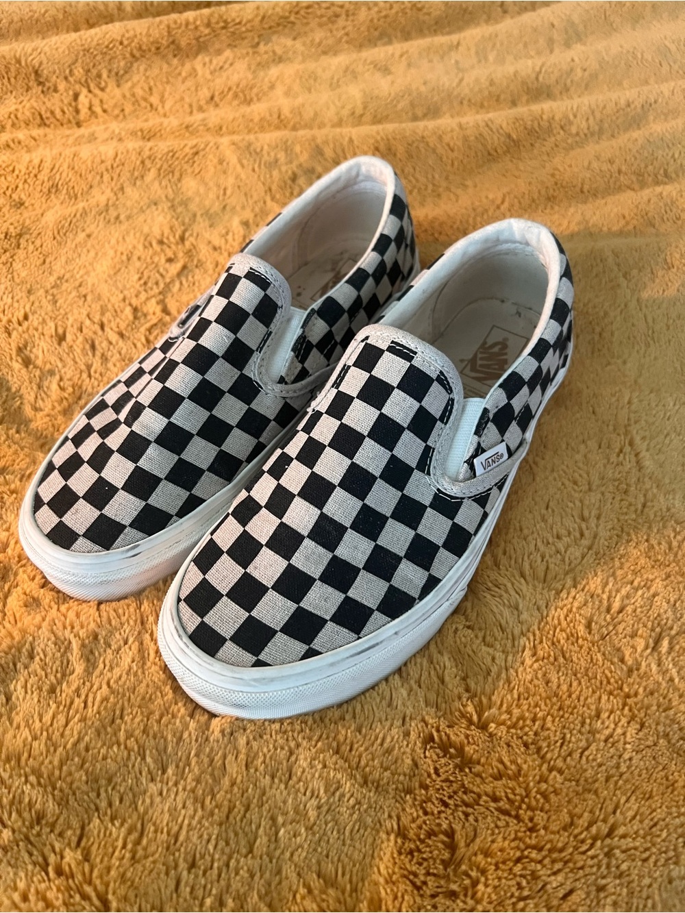 Vans Slip Ons - black and tan checkered with white sole